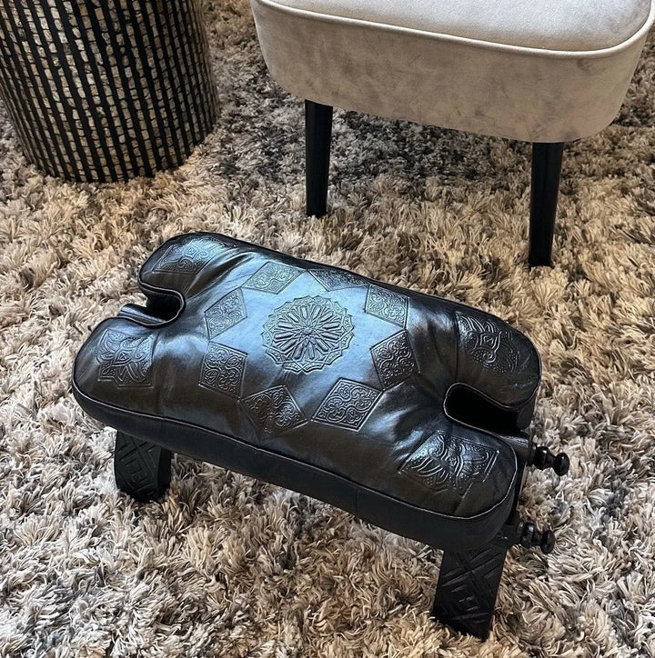 Black Moroccan Camel Saddle Stool, Genuine Leather Cushion and Solid Cedar Wood Carved Base. - JA ZWIIN